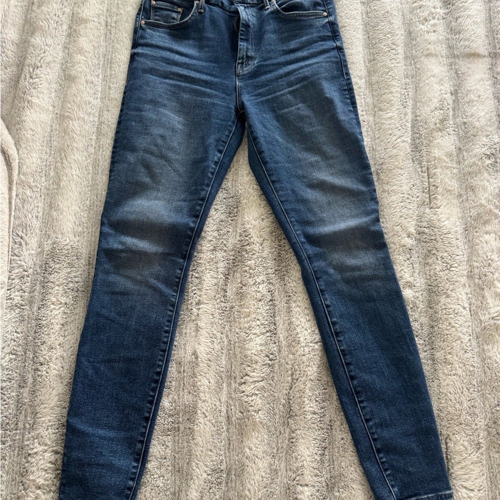 MOTHER  Skinny Jeans with Subtle Fading.High waisted looker Wash/let’s split